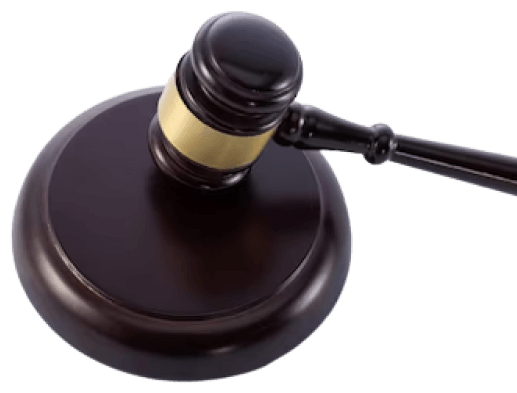 Closeup shot of the judge's gavel on a document of the lawsuit